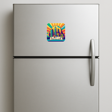 Load image into Gallery viewer, Atlanta Vivid Sunrise Magnet featuring bold pop-culture design