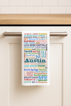 Load image into Gallery viewer, Austin In Words Tea Towel featuring bold pop-culture design