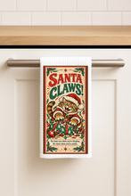 Load image into Gallery viewer, Santa Claws Cat Tea Towel — kitchen lifestyle view
