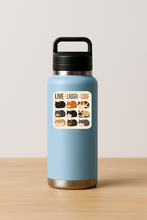 Load image into Gallery viewer, Live Laugh Loaf Sticker featuring bold pop-culture design
