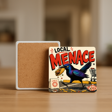 Load image into Gallery viewer, Local Menace Grackle Stone Coaster featuring bold pop-culture design
